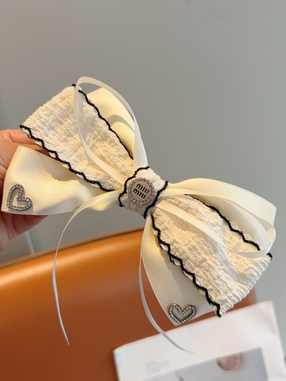 Miu Miu Cream Fabric Bow Hair Clip Black Wavy Trim Rhinestone Heart Crystal Logo